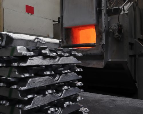 Aluminum casting furnace. Aluminum ingots.